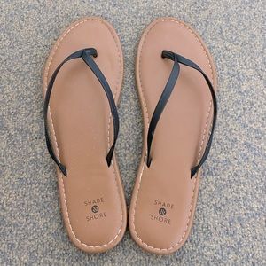tan flip flops